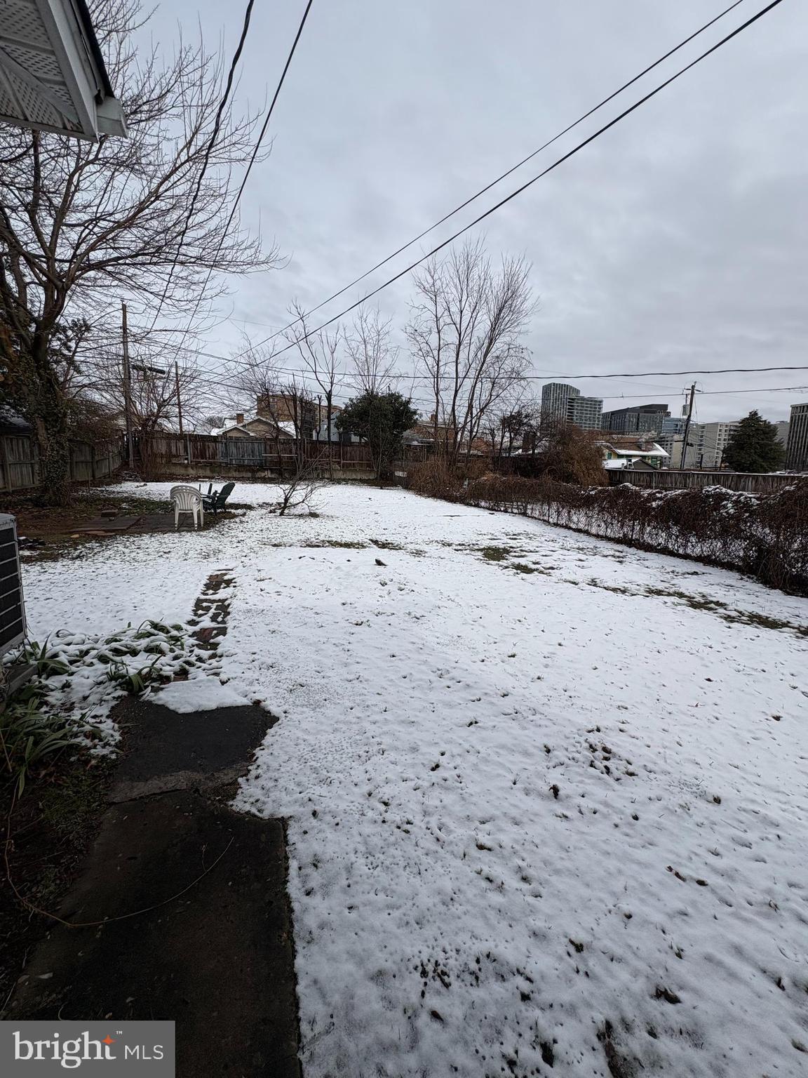 523 24th Street South Arlington, VA 22202 - Photo 16 of 18 a view of a road with a snow on the road