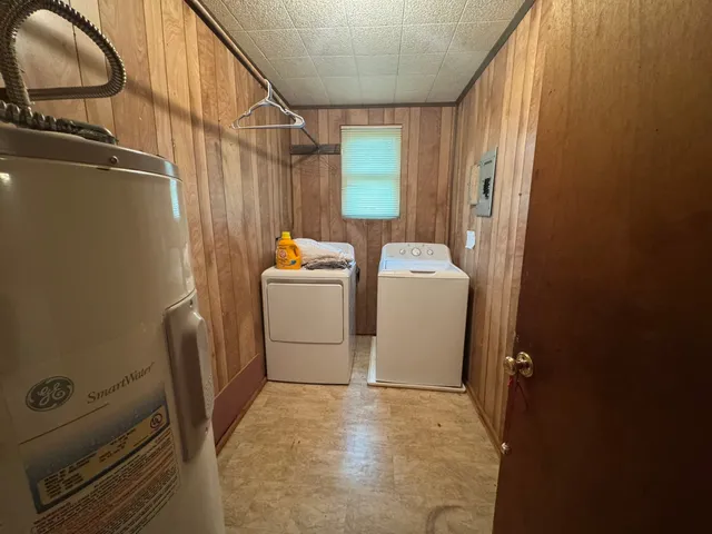 a bathroom with a toilet and a bathtub