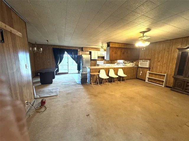 a view of a livingroom with furniture