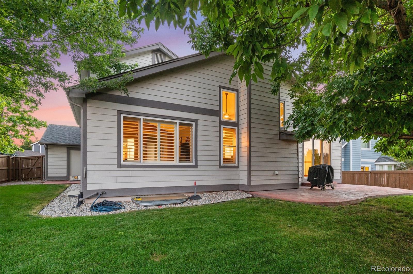 9836 Buckingham Court Highlands Ranch, CO 80130 - Photo 38 of 42 a house view with a garden space