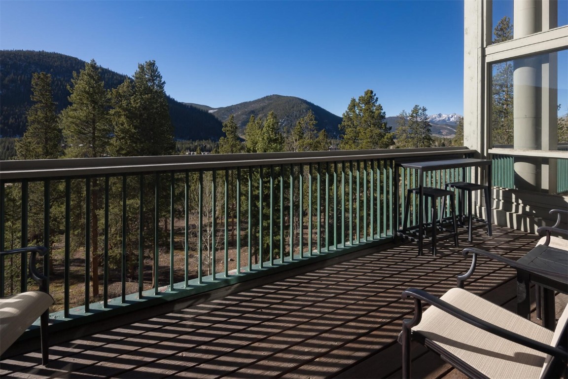 22097 Saints John Road, Unit 2526 Keystone, CO 80435 - Photo 11 of 42 a view of a roof deck with wooden floor and fence