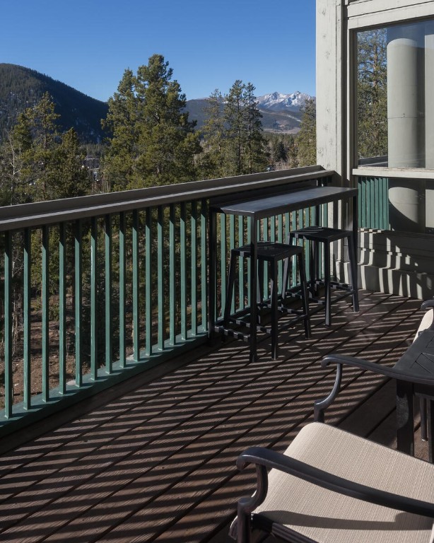 22097 Saints John Road, Unit 2526 Keystone, CO 80435 - Photo 12 of 42 a view of a balcony with wooden floor