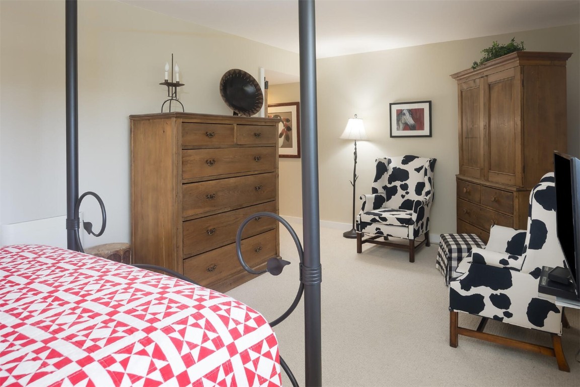 22097 Saints John Road, Unit 2526 Keystone, CO 80435 - Photo 19 of 42 a bedroom with a bed and a dresser