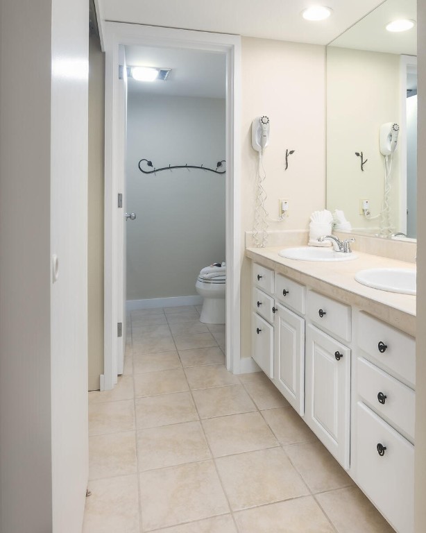 22097 Saints John Road, Unit 2526 Keystone, CO 80435 - Photo 20 of 42 a spacious bathroom with a granite countertop sink a toilet and a shower