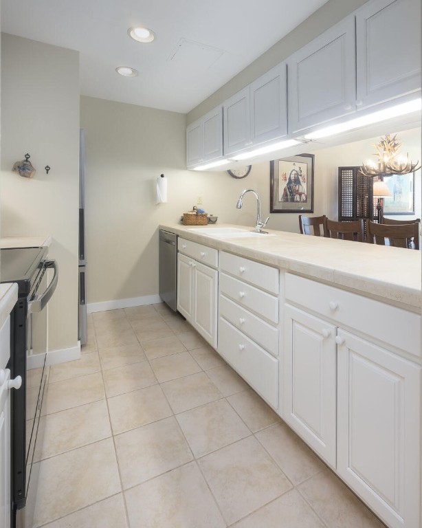 22097 Saints John Road, Unit 2526 Keystone, CO 80435 - Photo 9 of 42 a spacious bathroom with a sink and a mirror