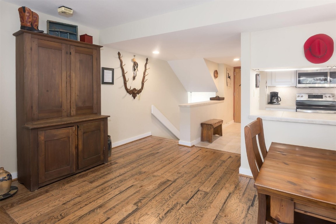 22097 Saints John Road, Unit 2526 Keystone, CO 80435 - Photo 10 of 42 a view of kitchen with furniture and wooden floor