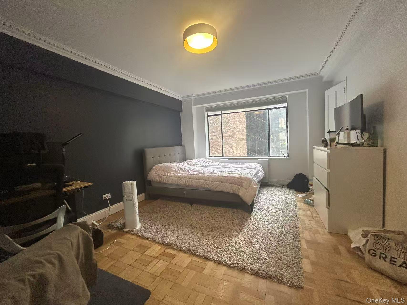 310 Lexington Avenue, Unit 5A Manhattan, NY 10016 - Photo 2 of 9 Bedroom with ornamental molding