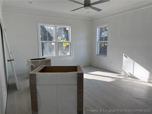a kitchen with a cabinets and window