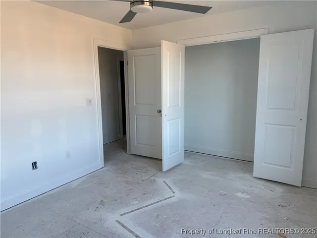 an empty room with a bathroom