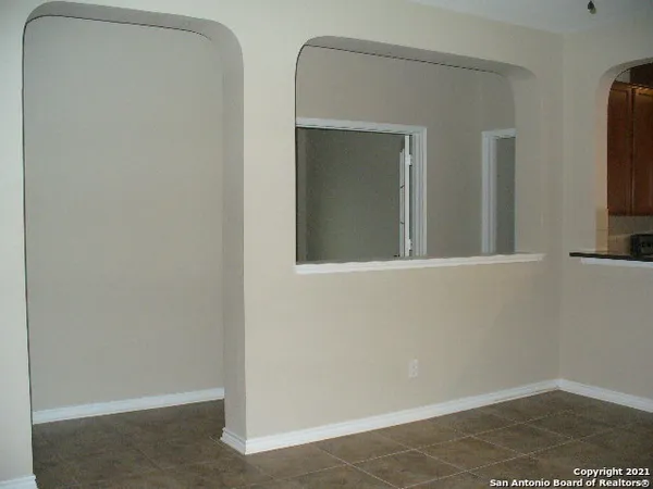 a kitchen with stainless steel appliances granite countertop a refrigerator stove and microwave