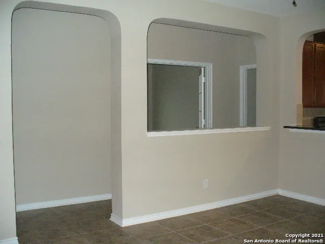 a kitchen with stainless steel appliances granite countertop a refrigerator stove and microwave