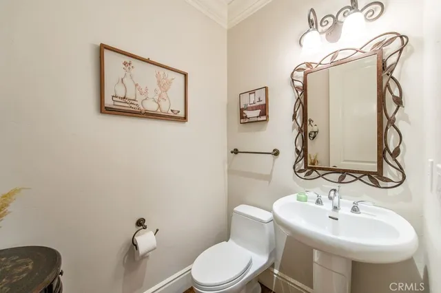 a front view of a house with swimming pool having outdoor seating