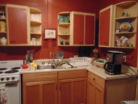 658 Sweetwater Road Philadelphia, TN 37846 - Photo 3 of 16 a kitchen with a sink and a cabinets