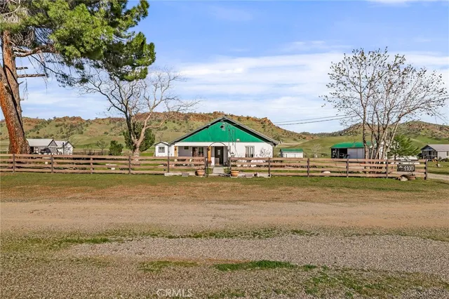 a aerial view of a house with a big yard