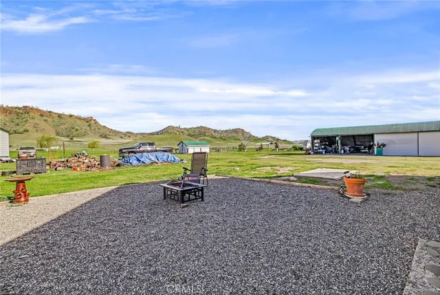 a view of an ocean and a mountain
