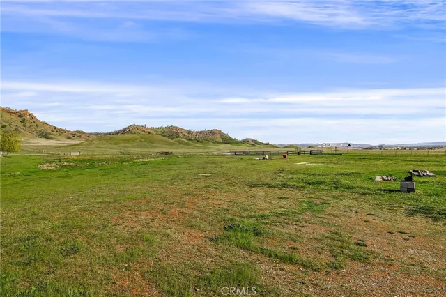 a view of a mountain with a ocean view