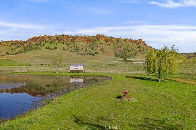 a view of an ocean and a mountain