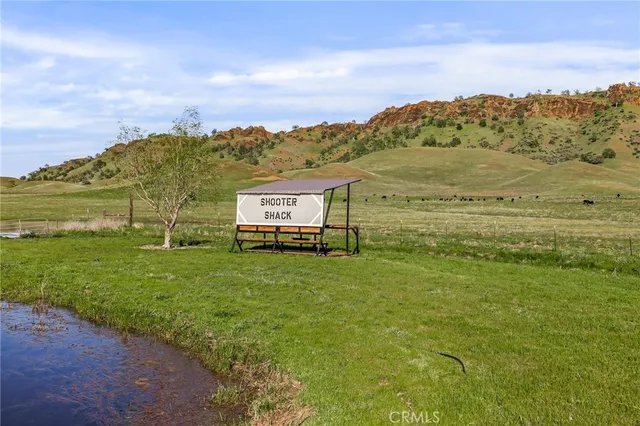 a bed sitting in a room next to a building