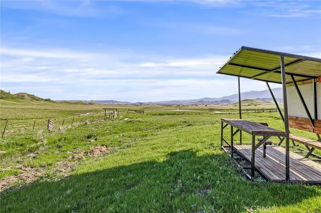 a picture of a bench in front of a microwave