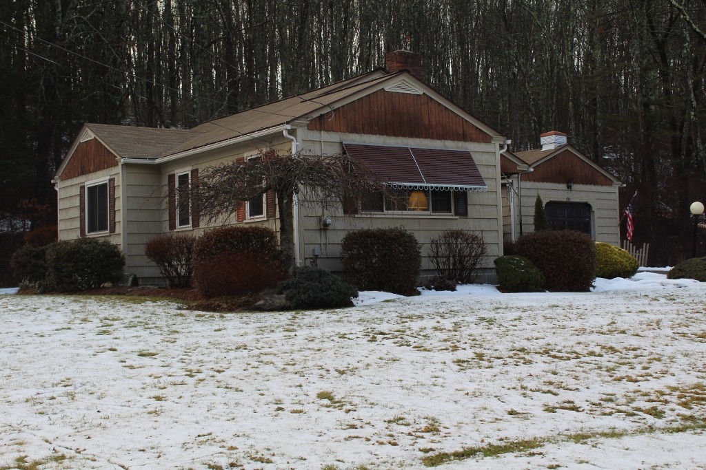 430 Worcester Road Barre, MA 01005 - Photo 1 of 17 a front view of a house with a yard