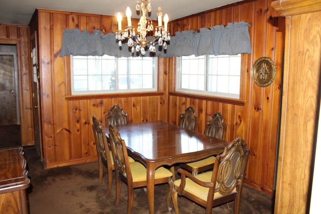 430 Worcester Road Barre, MA 01005 - Photo 10 of 17 a view of a dining room with furniture and chandelier