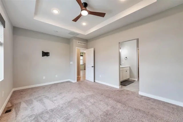 a spacious bathroom with a double vanity sink mirror and double