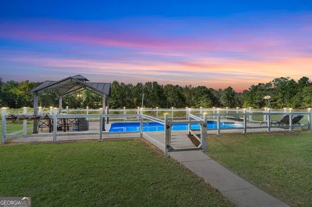 a view of a park with furniture