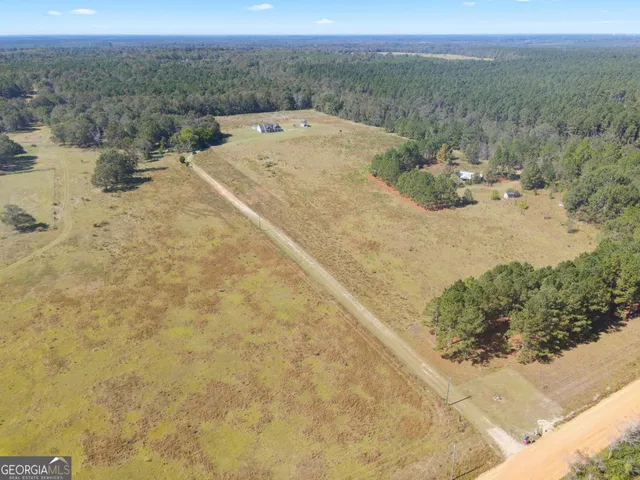 a view of a dry yard with a sink