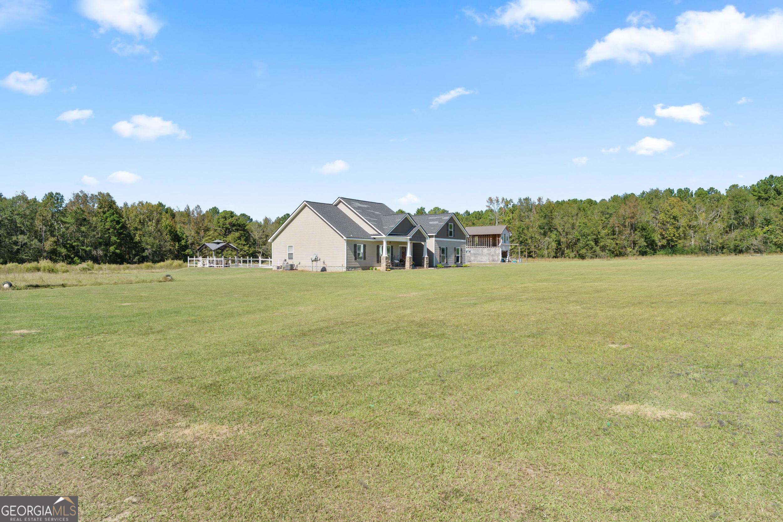 1287 Idlewood-Munnerlyn Road Waynesboro, GA 30830 - Photo 42 of 48 a view of a lake