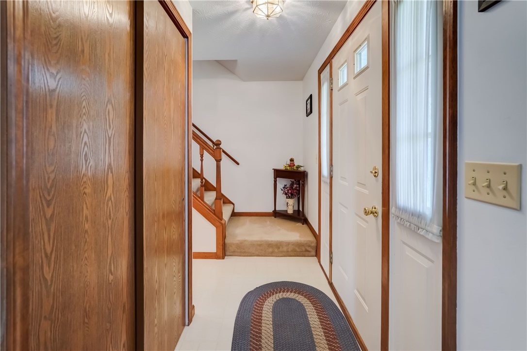 39 Highview Circle Sweden, NY 14420 - Photo 7 of 43 a view of the entry from the living room