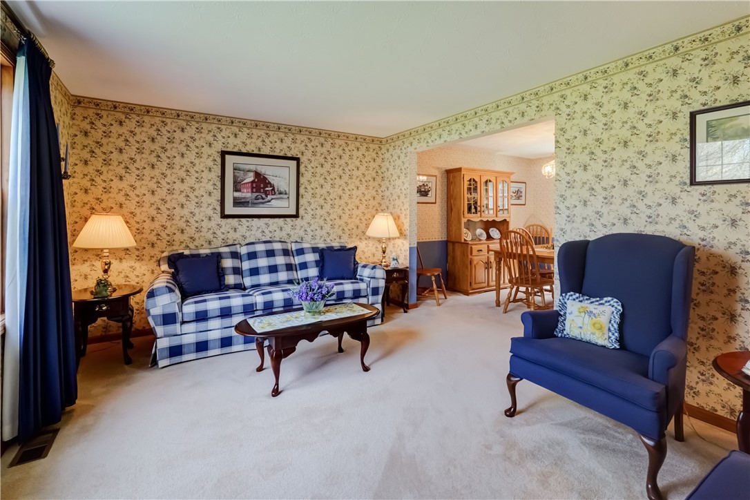 39 Highview Circle Sweden, NY 14420 - Photo 9 of 43 living room looking towards the dining room.