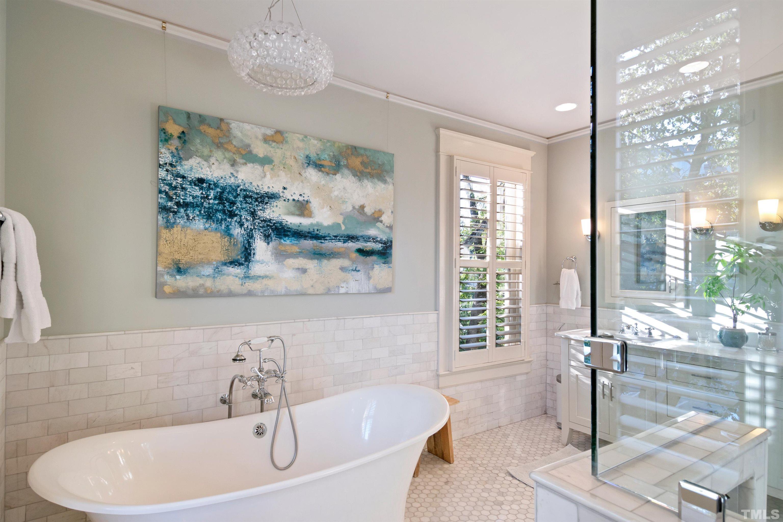 115 Watts Street Durham, NC 27701 - Photo 17 of 30 a bathroom with a tub and a shower