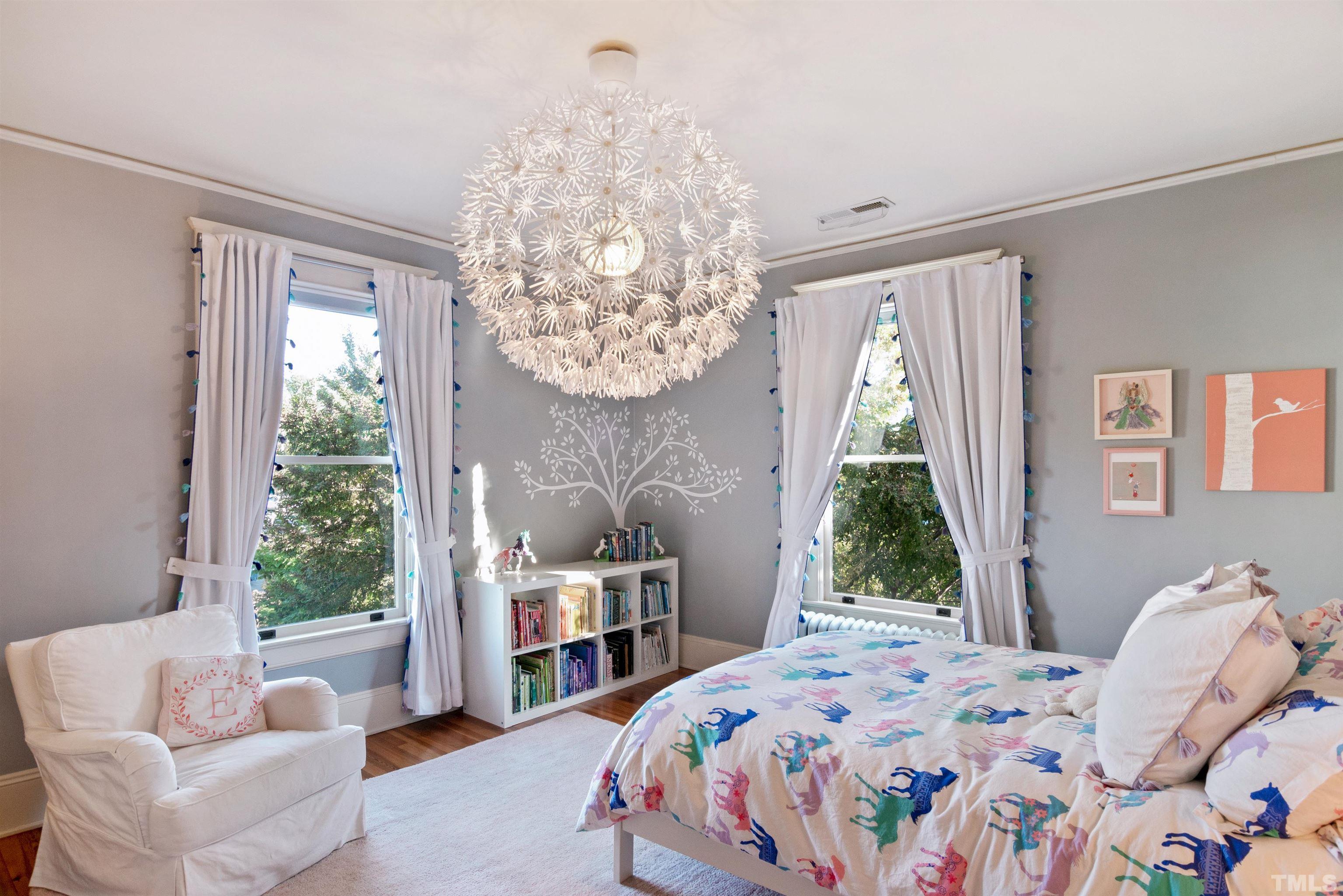 115 Watts Street Durham, NC 27701 - Photo 18 of 30 a bedroom with a bed and a window