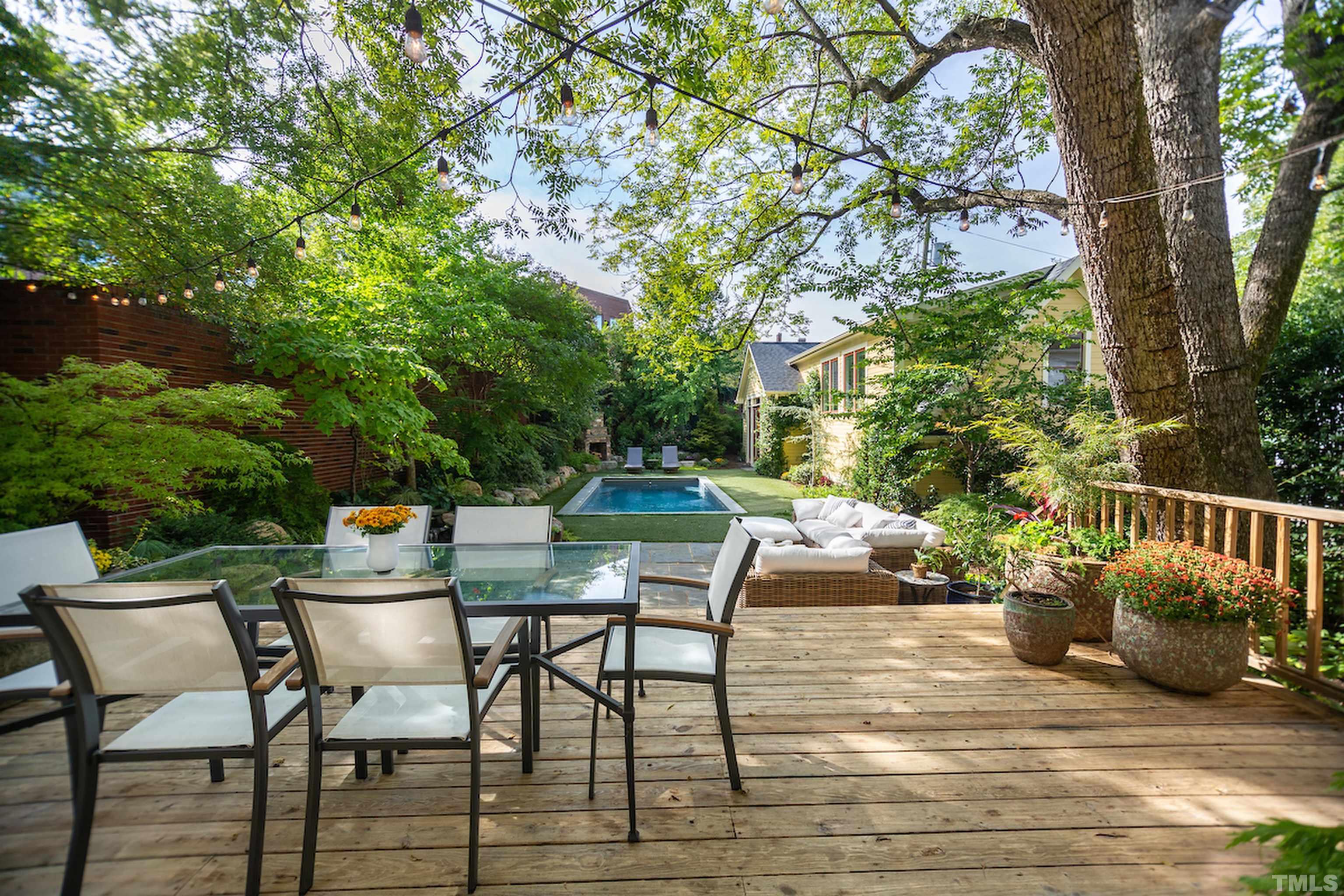 115 Watts Street Durham, NC 27701 - Photo 21 of 30 a backyard of a house with seating space