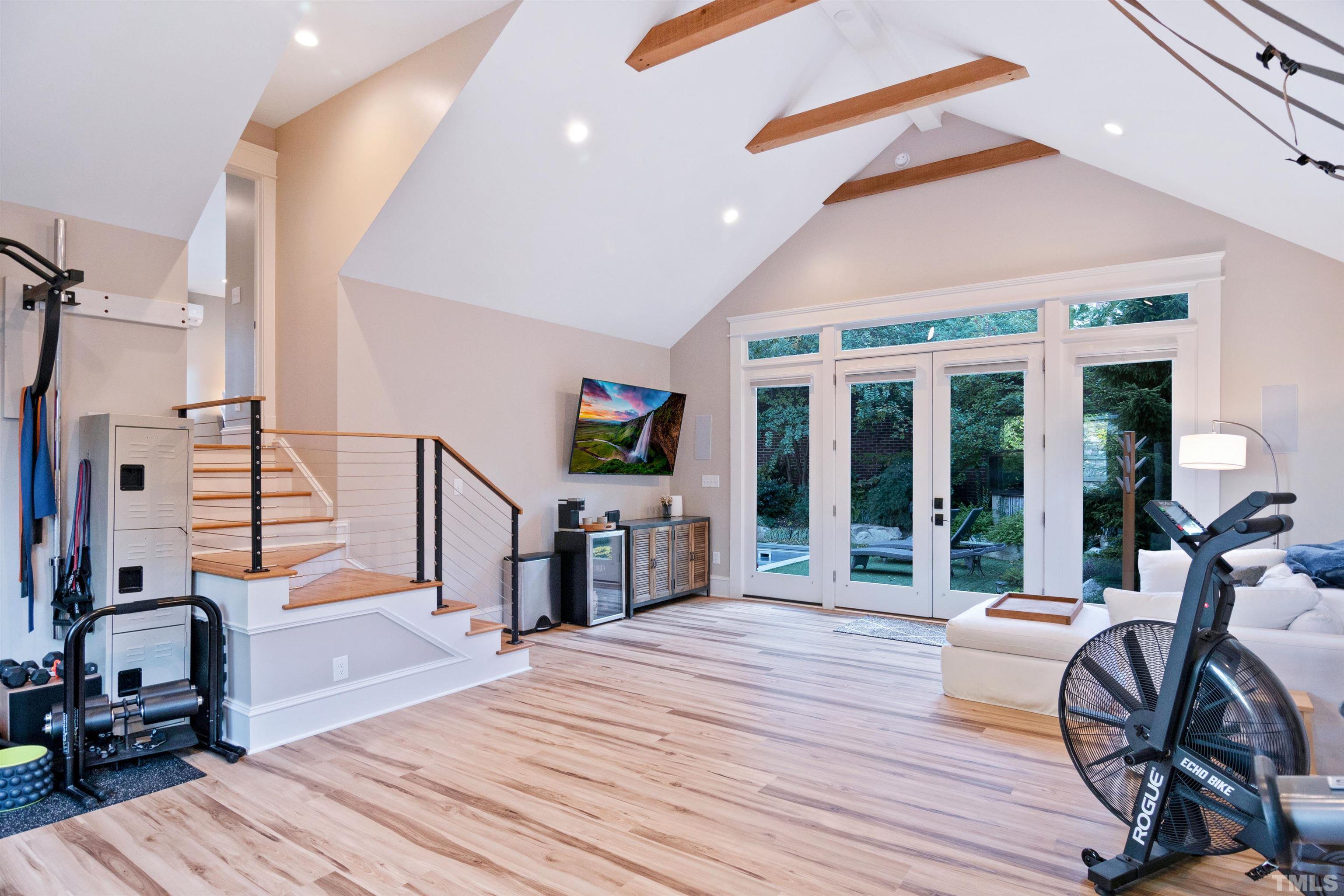 115 Watts Street Durham, NC 27701 - Photo 27 of 30 a view of a living room and bedroom with wooden floor