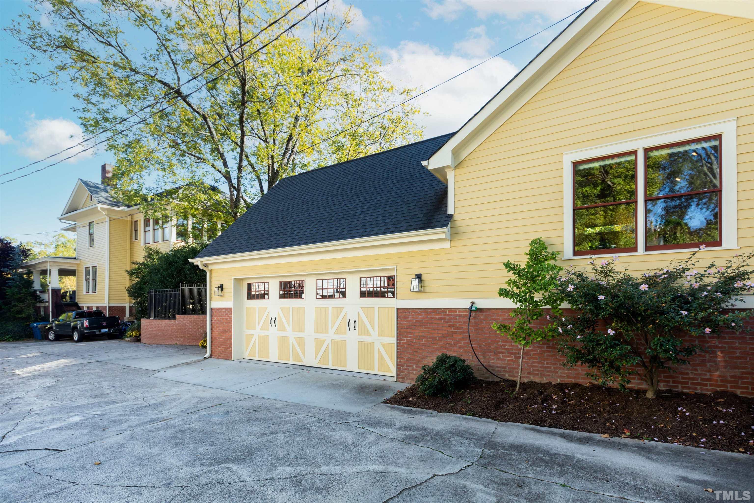 115 Watts Street Durham, NC 27701 - Photo 30 of 30 a view of a house with a yard