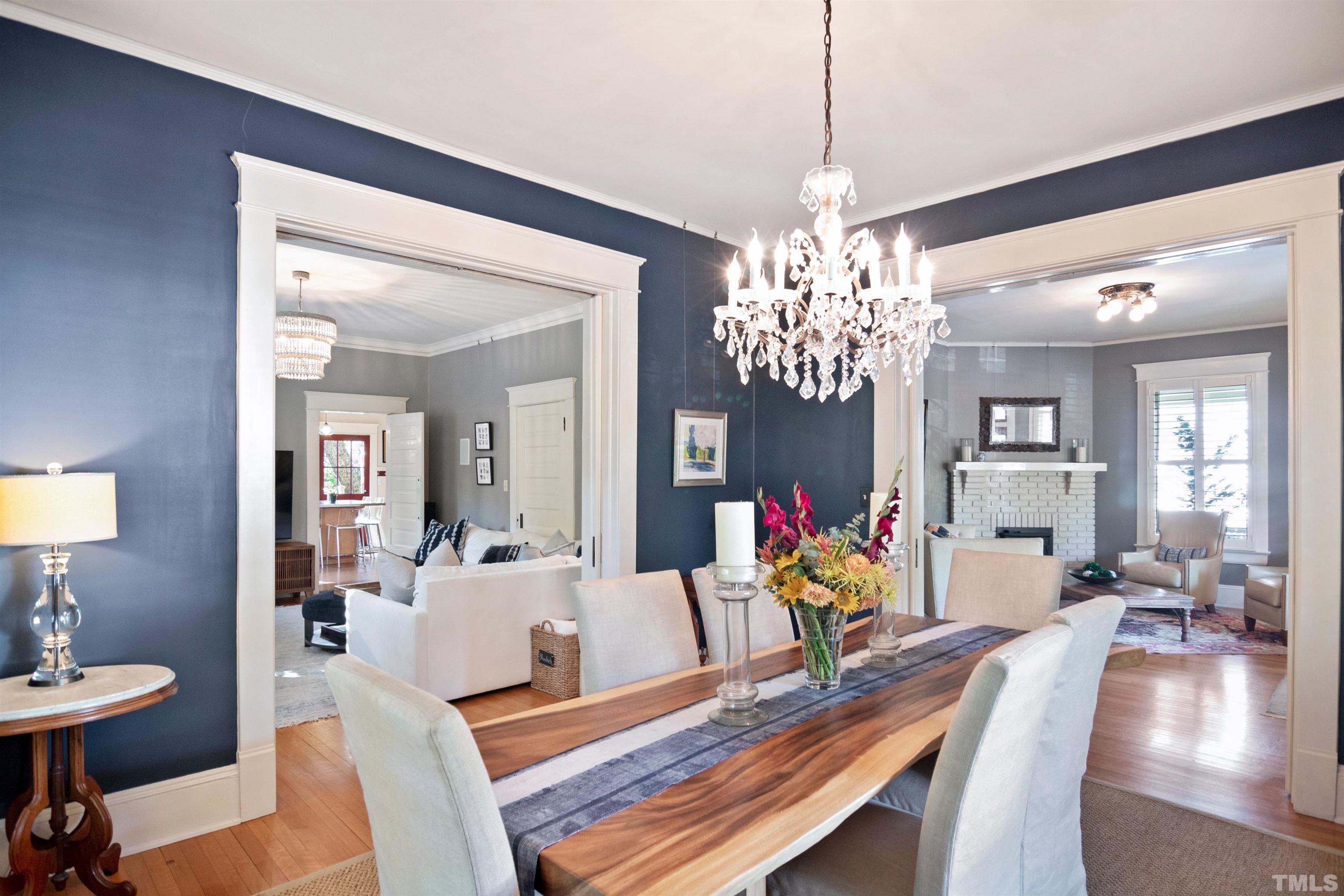 115 Watts Street Durham, NC 27701 - Photo 6 of 30 a view of a dining room with furniture and wooden floor