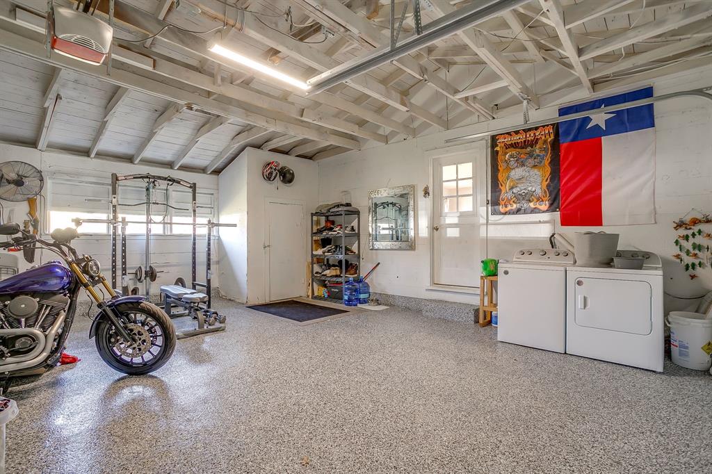 809 Euclid Street Cleburne, TX 76033 - Photo 21 of 26 a view of a room with storage and utility