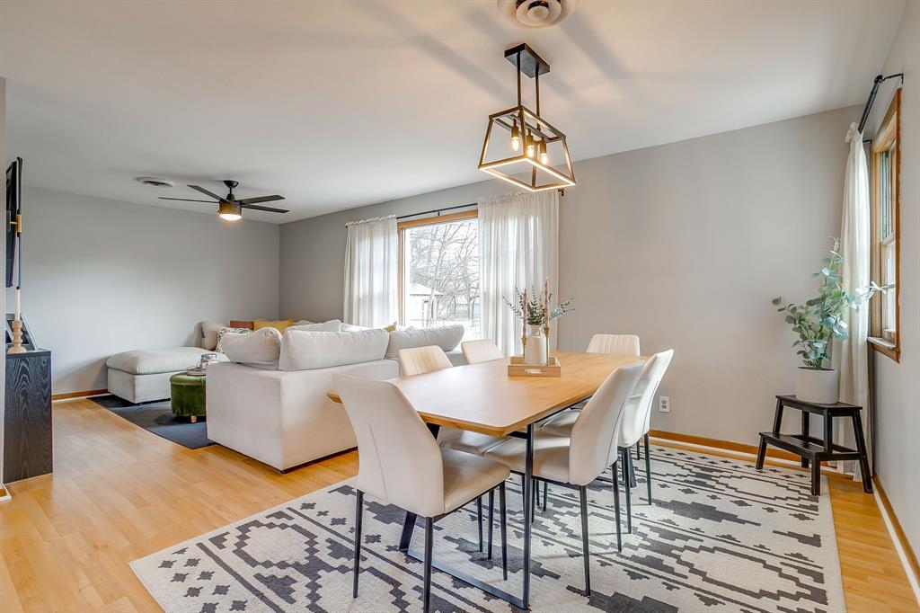 809 Euclid Street Cleburne, TX 76033 - Photo 10 of 26 a view of a dining room with furniture window and wooden floor