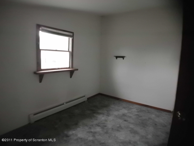78 B St Tikhons Road Waymart, PA 18472 - Photo 6 of 10 an empty room with a window