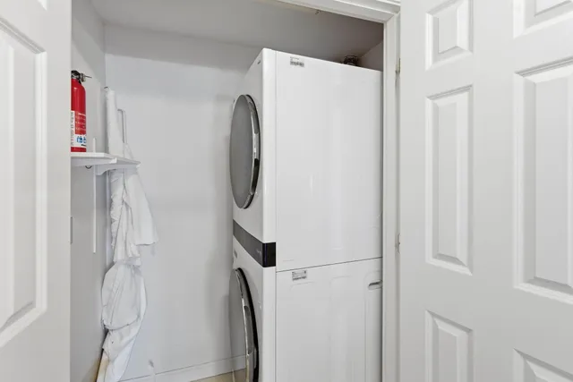 a bathroom with a shower and a sink