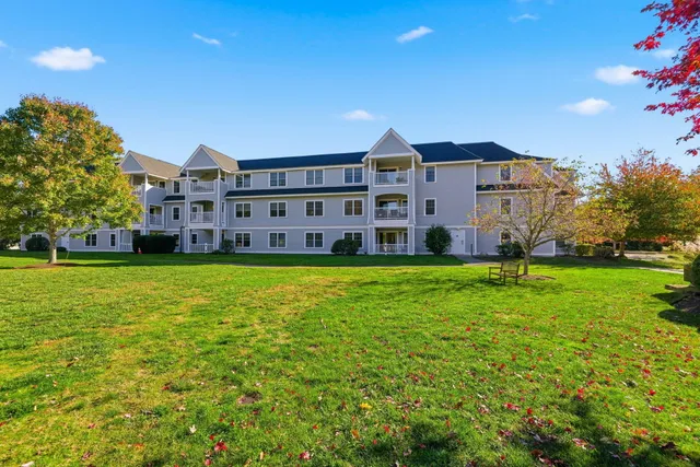 a view of a house with a big yard