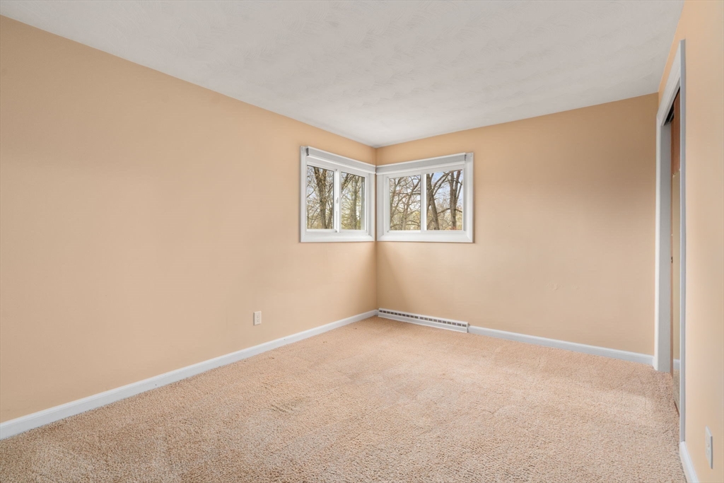 18 Royce Road Framingham, MA 01701 - Photo 17 of 30 a view of an empty room with a window