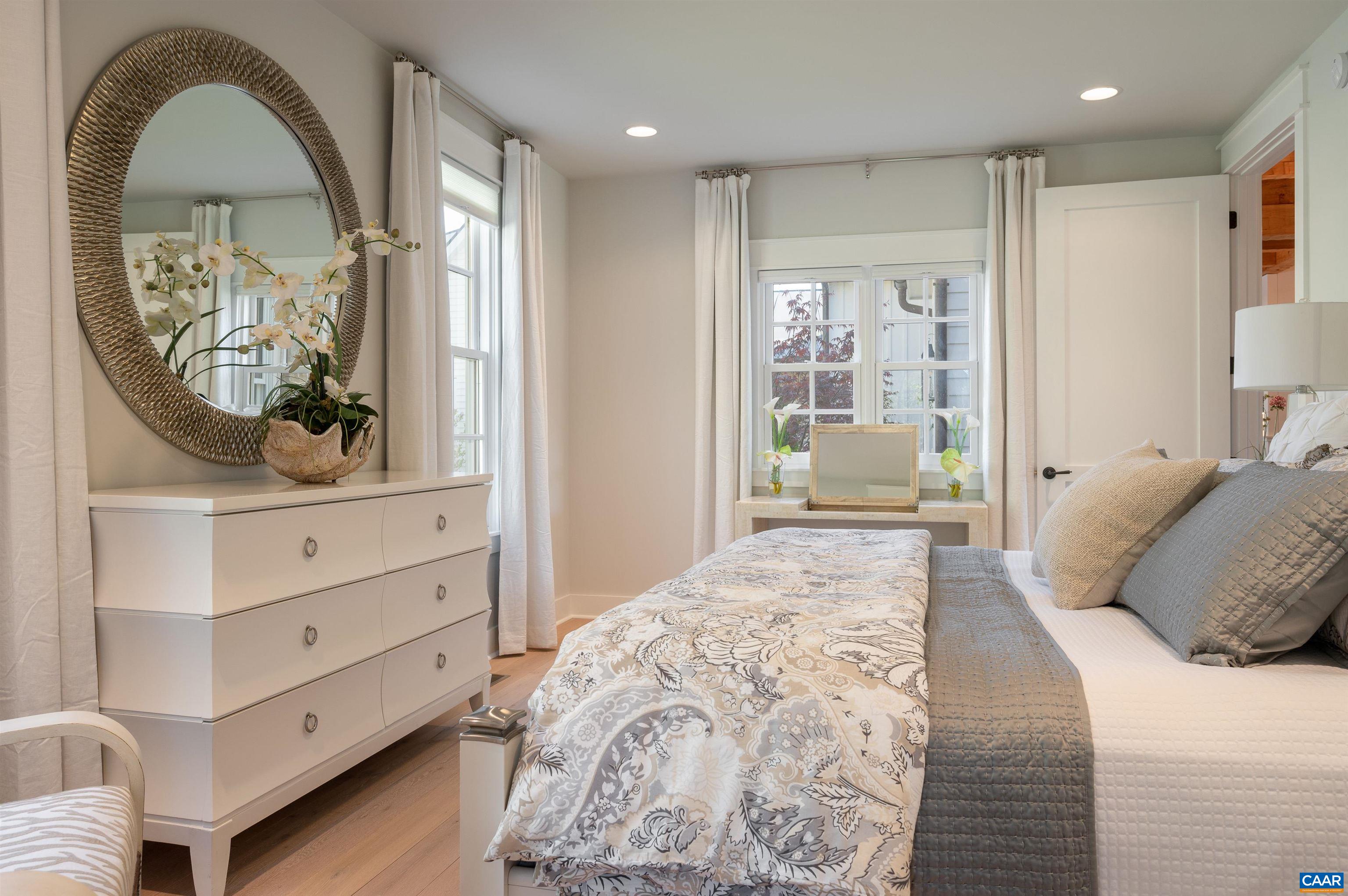 3140 Sutherland Road North Garden, VA 22959 - Photo 12 of 37 a bedroom with a bed and a mirror
