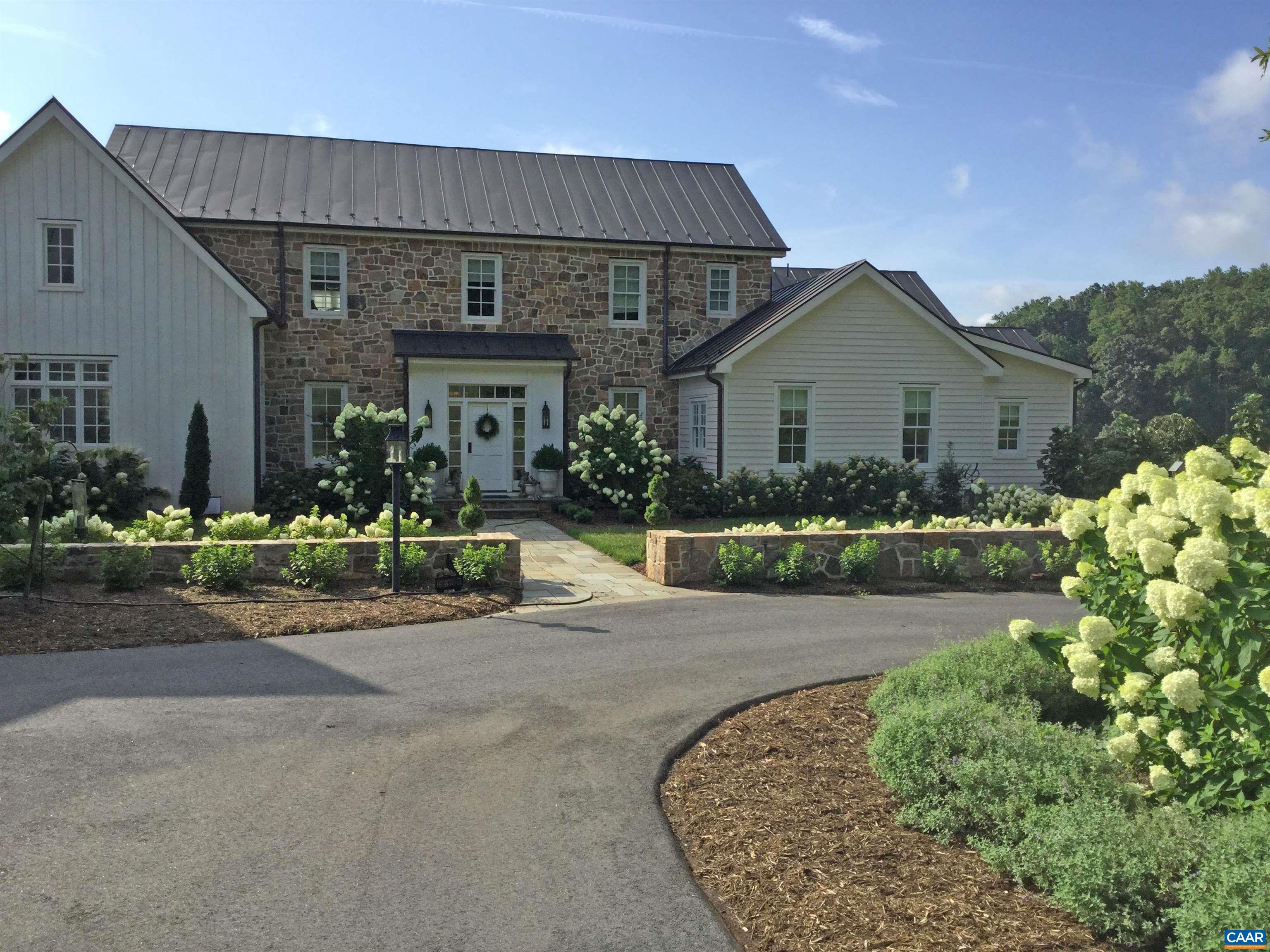 3140 Sutherland Road North Garden, VA 22959 - Photo 2 of 37 front view of a house with a small yard