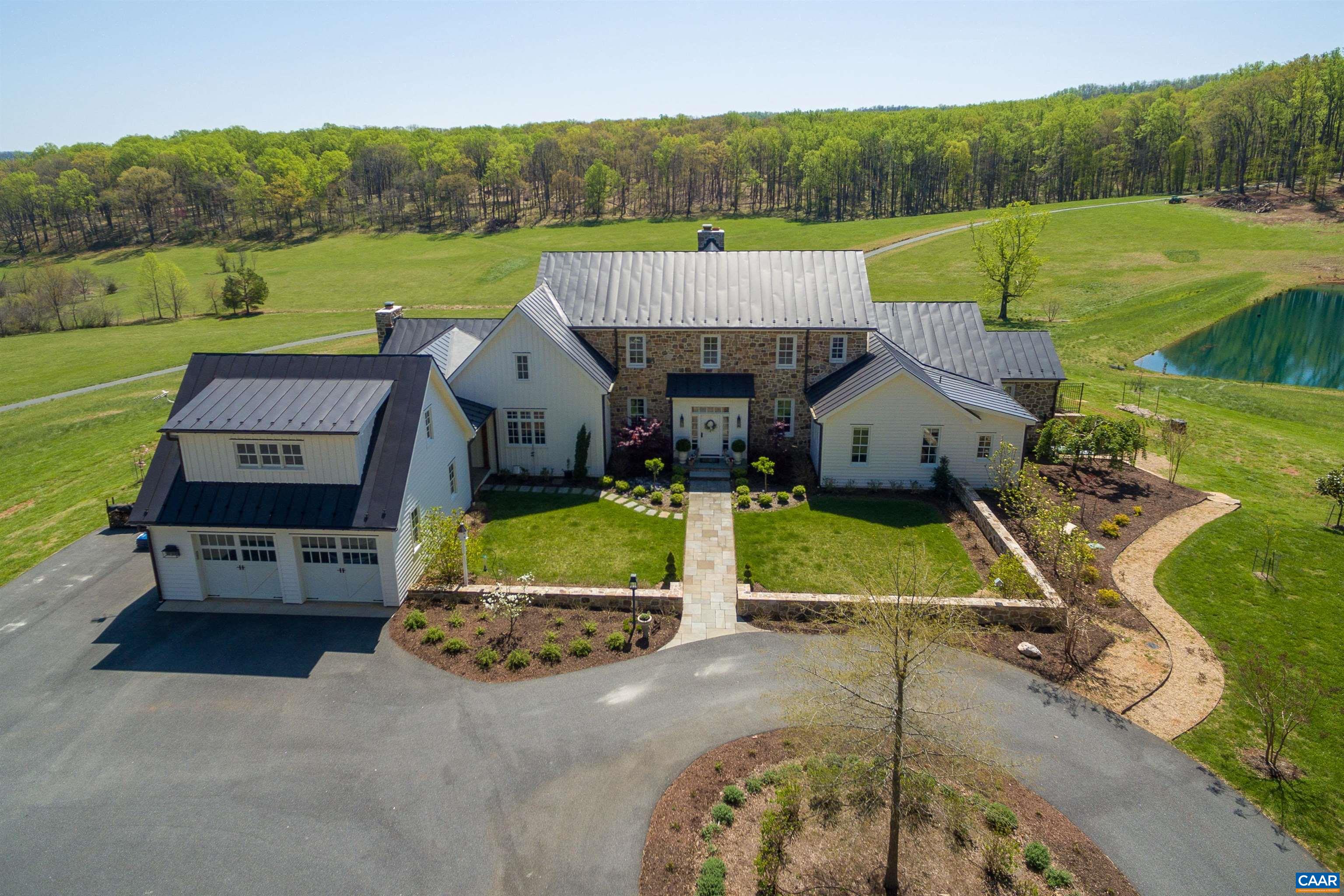 3140 Sutherland Road North Garden, VA 22959 - Photo 28 of 37 an aerial view of a house with a big yard