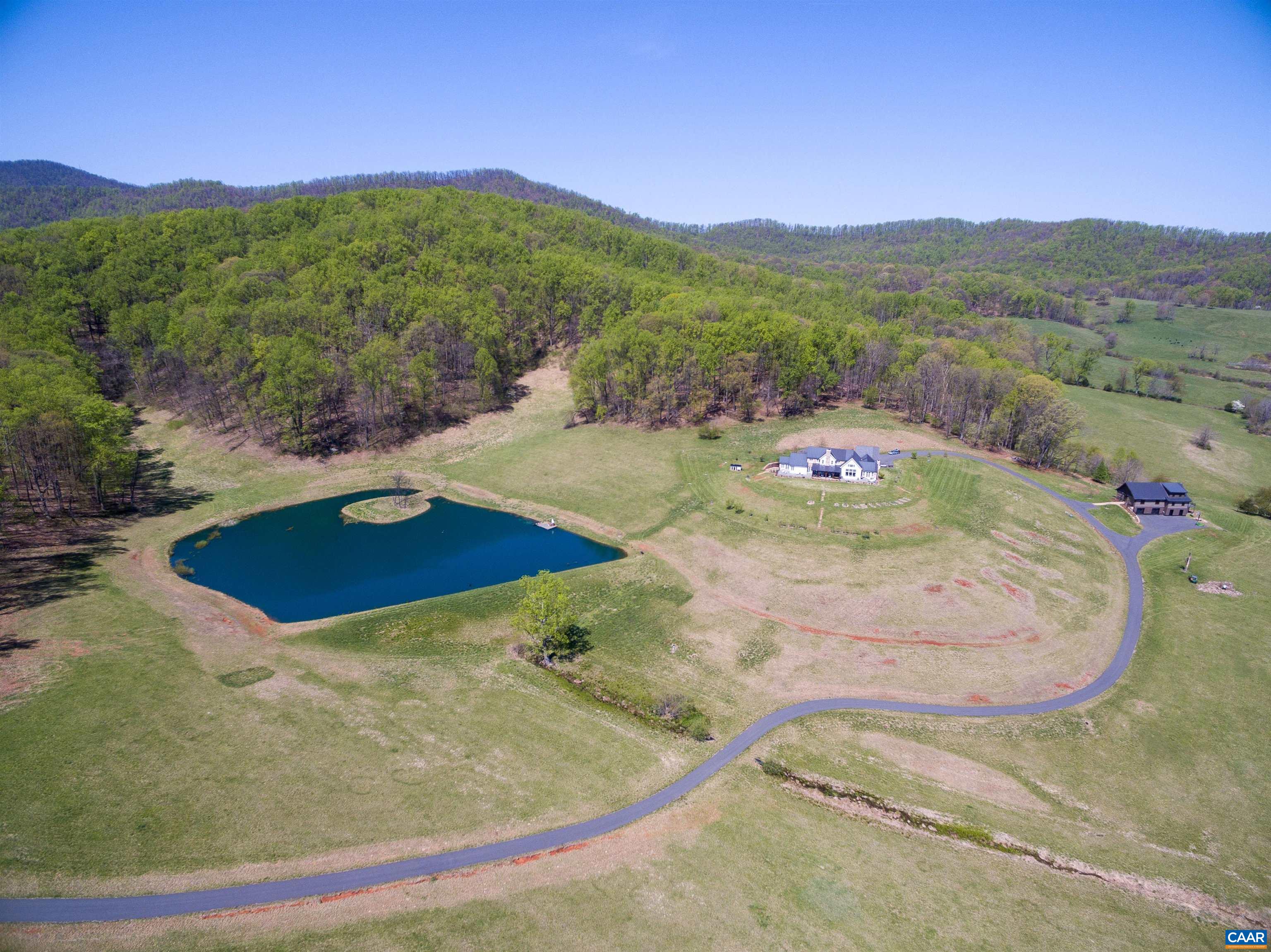 3140 Sutherland Road North Garden, VA 22959 - Photo 34 of 37 a view of a swimming pool with a yard and mountain view