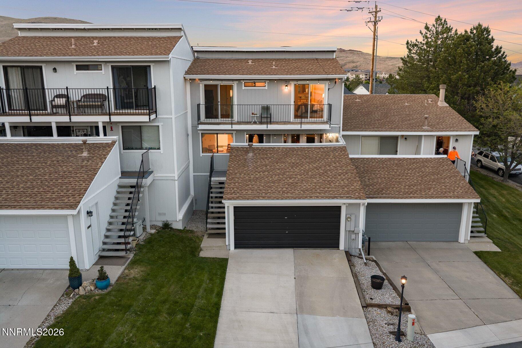 3415 Balboa Drive Reno, NV 89503 - Photo 39 of 61 a front view of a house with a yard and garage