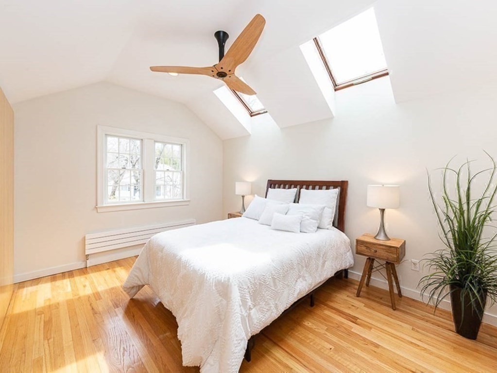 26 Bow Road Newton, MA 02459 - Photo 30 of 37 a bedroom with a bed and a window