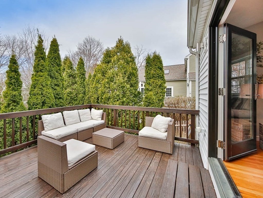 26 Bow Road Newton, MA 02459 - Photo 9 of 37 a view of a balcony with couches